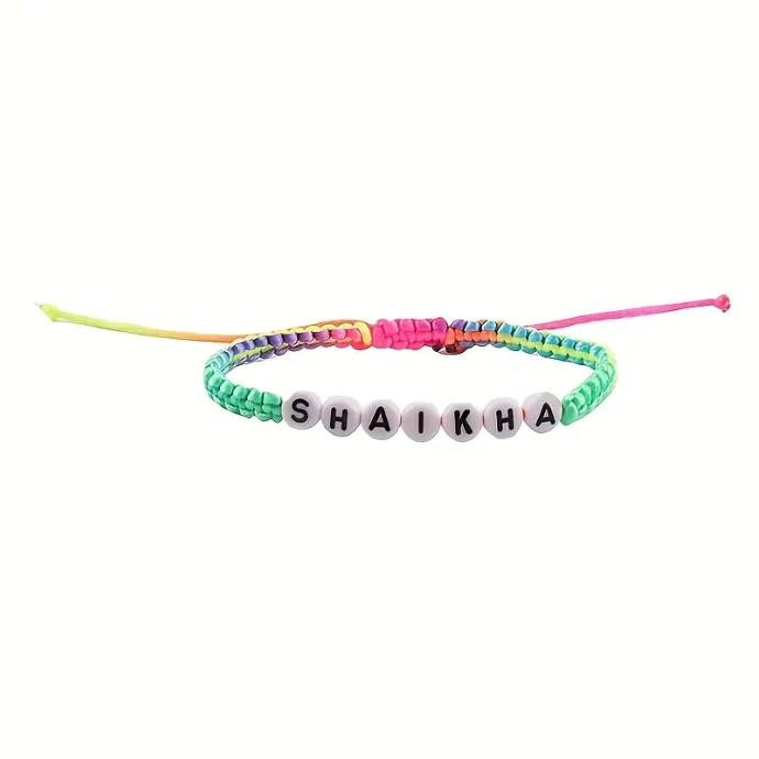 Multicolor braided cord letter bracelet.